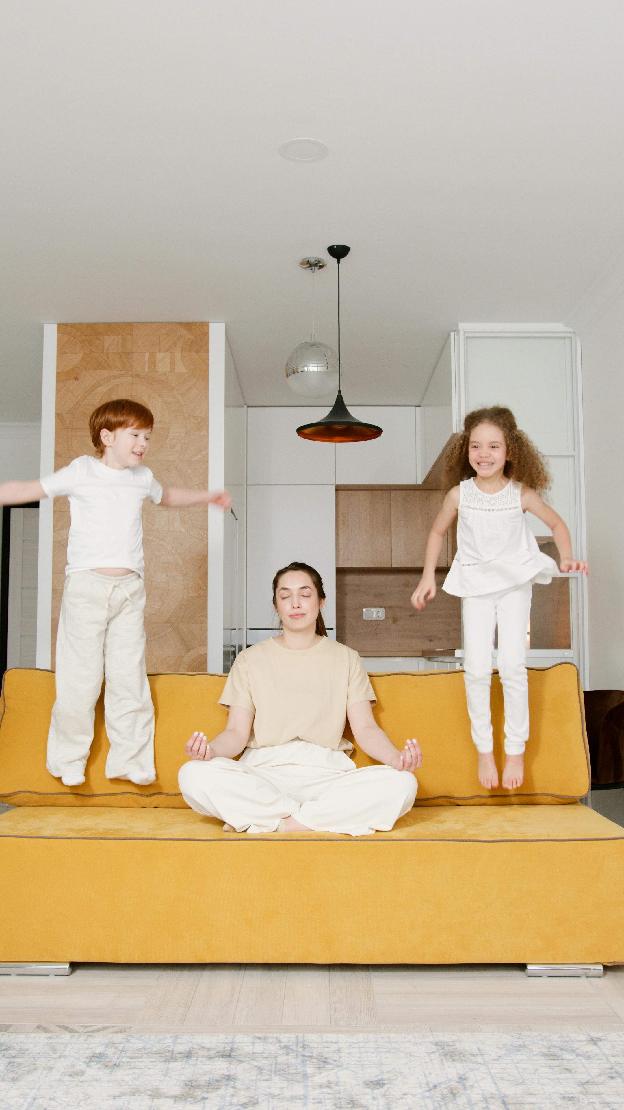 Dynamic shot of a child jumping joyfully, representing energy transformed through yoga.